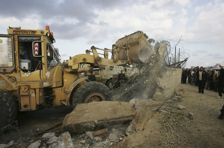 Photo of the demolition of  a similar wall in Gaza by Khalil Hamra/AP, ripped from Time.com.